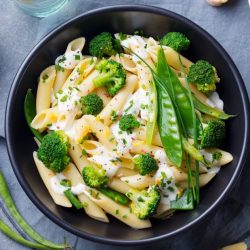 Pasta with white sauce and broccoli